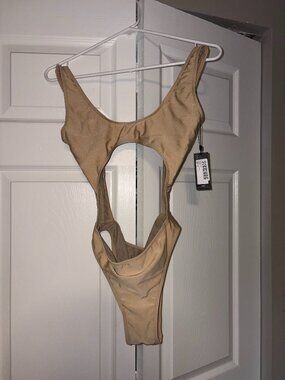 Pretty Little Thing Cut Out Body Suit in Color Tan